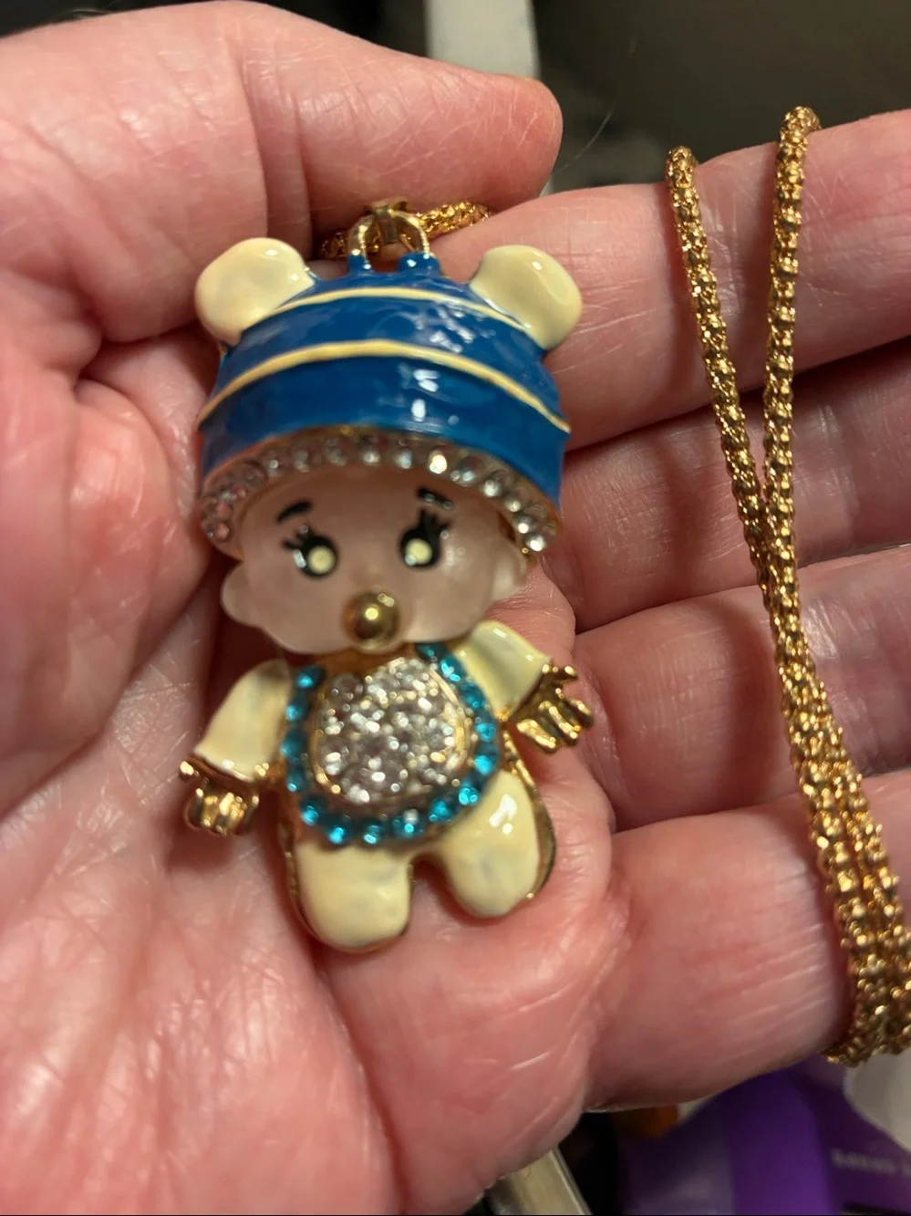Moveable baby boy Pendant with Blue Hat and Crystal Accents. Head/body turn.